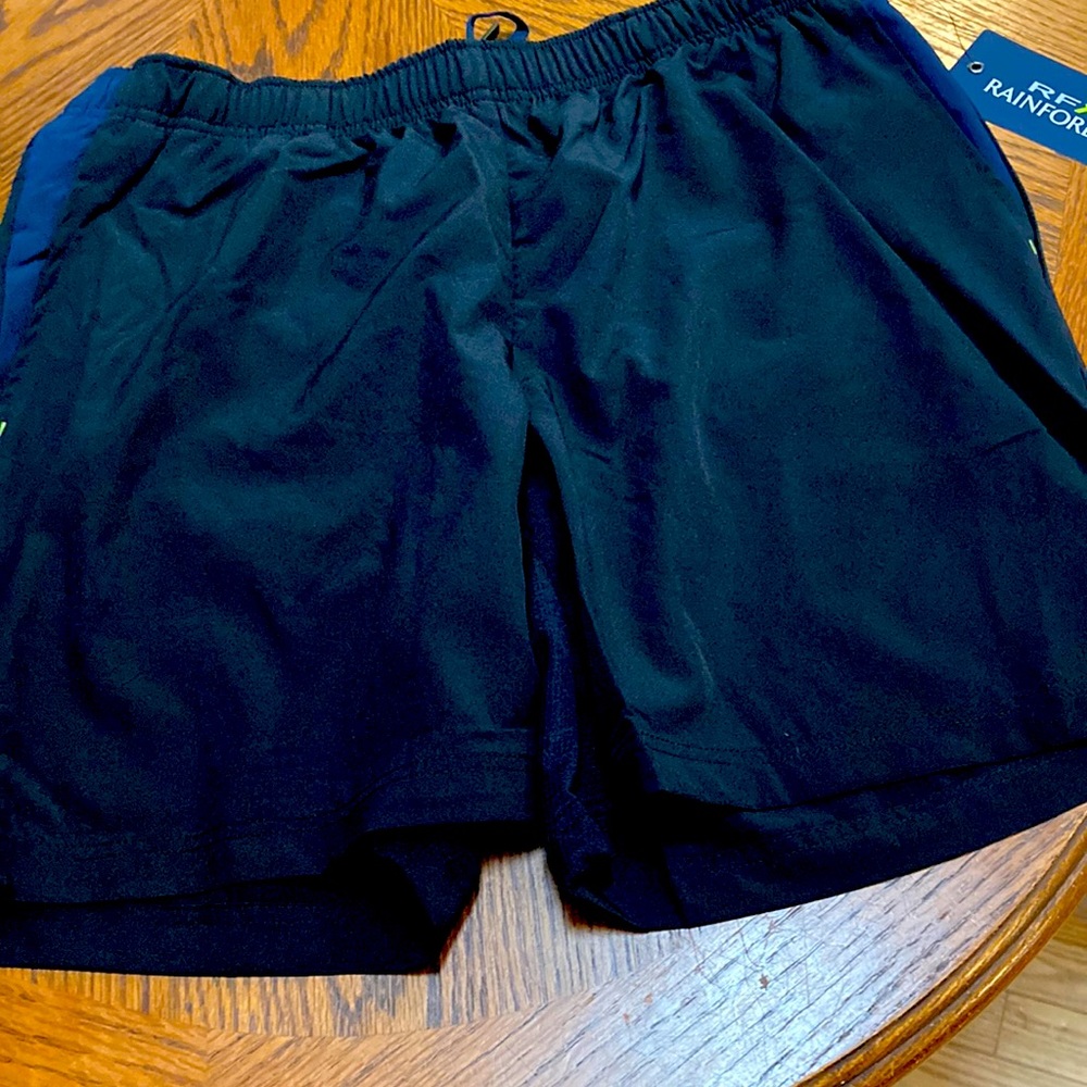 NWT Rain Forest is a water resistant shorts. They are a thin durable fabric.